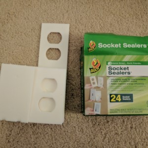 Duck socket sealers to insulate interior and exterior power outlets.