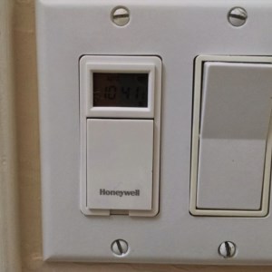 A Honeywell Programmable light switch. Capable of 7 different schedules!