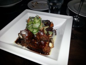 Served over whipped potatoes. The ribs were incredibly delicious, and the meat was tender... fall off the bone.