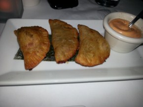 An order of appetizer, that came with three slices, was rather small portioned. I've had better empanadas.